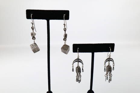 Pair of Vintage Sterling Silver Earrings: Pair of Vintage Sterling Silver Earrings. The lot includes two pairs of vintage sterling silver earrings. Featuring a pair of vintage c1995 artisan made sterling earrings consisting of a textured cube