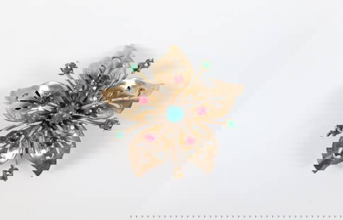 1940s Sterling Coro Craft Flower Brooch/Pendant : 1940s Sterling Coro Craft Flower Brooch/Pendant. The lot includes a vintage 1940s 2.15'' x 2.14'' sterling lily brooch/pendant by Coro Craft featuring multicolored rhinestones and petals with pierced