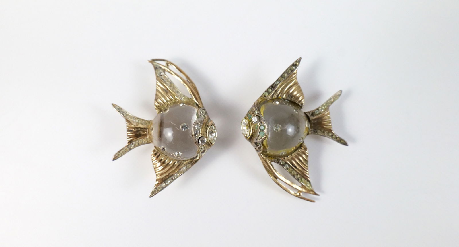 Pair of 1940s Sterling Coro Jelly Belly Angel Fish Fur Clips : Pair of 1940s Sterling Coro Jelly Belly Angel Fish Fur Clips. The lot includes a vintage 1940s pair of 1.81'' x 1.32'' gold vermeil sterling "Jelly Belly" angel fish fur clips with lucite bellies stud