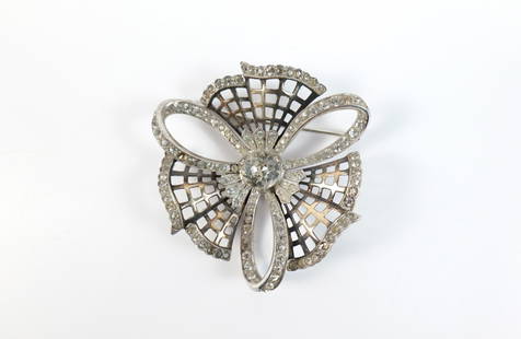 Vintage 1940s Sterling Brooch by Mazer : Vintage 1940s Sterling Brooch by Mazer. The lot includes a vintage 1940s 2.31'' x 2.18'' sterling triple loop bow-like brooch by Mazer set with glass crystal gems and a hinged bar closure with a C