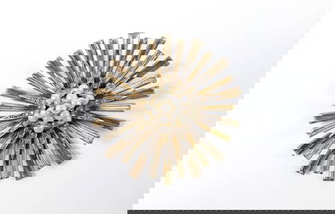 Midcentury Marcel Boucher Sterling Starburst Brooch: Mid Century Marcel Boucher Sterling Starburst Brooch. The lot includes a vintage mid-century 2.45'' round gold vermeil sterling starburst brooch by Marcel Boucher with a faux pearl center and