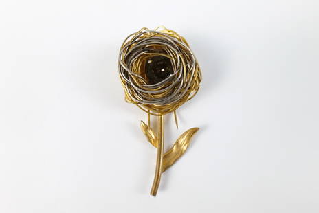Midcentury Gold Tone Depose Fur Clip : Midcentury Gold Tone Depose Fur Clip. The lot includes a vintage 3.11'' x 1.50'' gold and silver tone flower fur clip by Depose featuring a nest-like bloom with a large faux smokey quartz gem at its