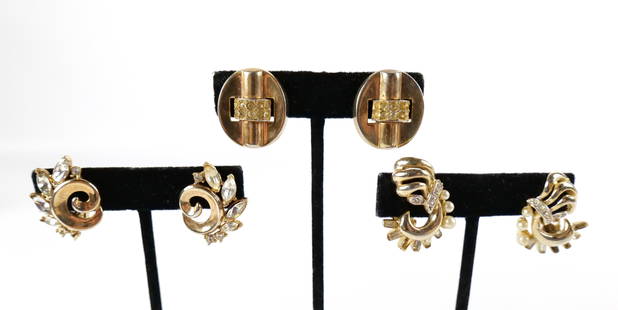 2 Pairs of 1940s Clip-On Earrings by Trifari: 2 Pairs of 1940s Clip-On Earrings by Trifari. The lot includes two vintage 1940s gold vermeil clip on earrings by Trifari. Featuring a 1.07'' x .82'' pair of 1940s gold vermeil clip on earrings by tri