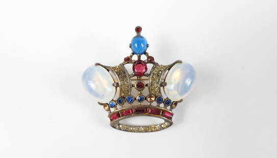 Large 1940s Sterling Trifari Crown Brooch: Large 1940s Sterling Trifari Crown Brooch. The lot includes a vintage 1940s 1.78'' x 1.92'' gold vermeil sterling crown brooch by Trifari set with blue and faux moonstone glass cabochons and red/white
