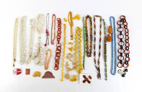 Mixed Group of Celluloid and Bakelite Jewelry: Mixed Group of Celluloid and Bakelite Jewelry. The lot includes a large mix of vintage 1940s celluloid and bakelite jewelry and salvage. Featuring 9 intact celluloid link necklaces ranging in length f