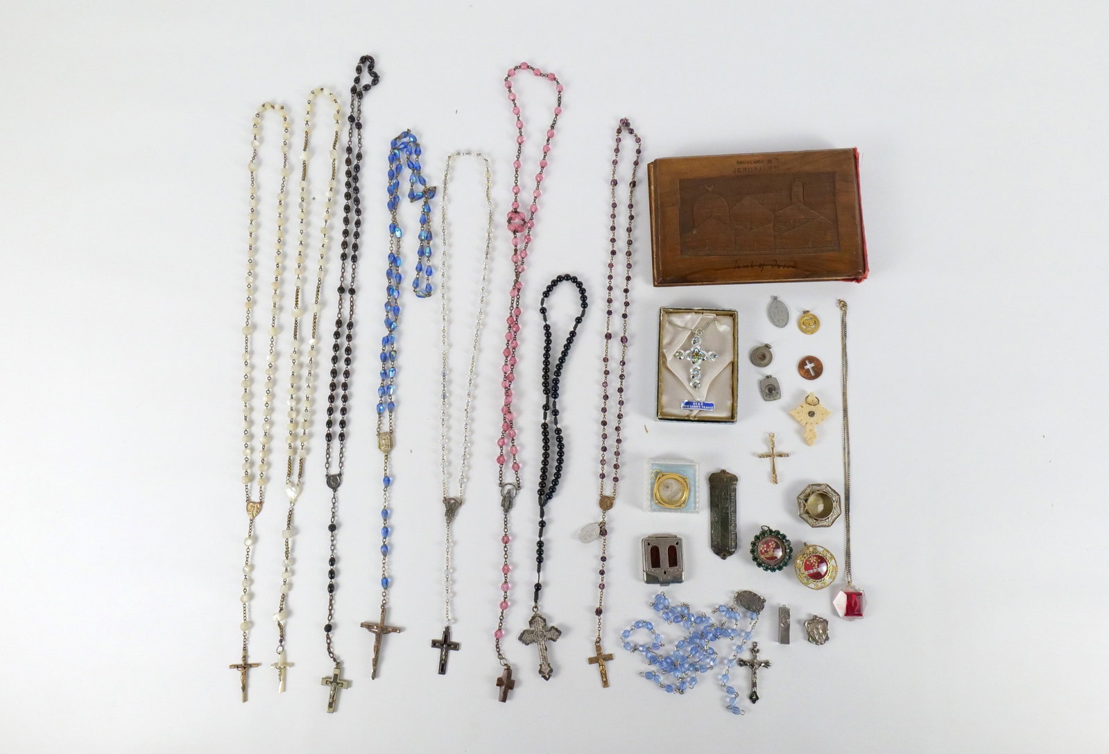 Lot of Vintage Catholic Relic Pendants and More: Lot of Vintage Catholic Relic Pendants and More. The lot includes a variety of vintage catholic relic pendants and more. Featuring a 1.29'' round gold and silver tone filigree reliquary pendant for a 