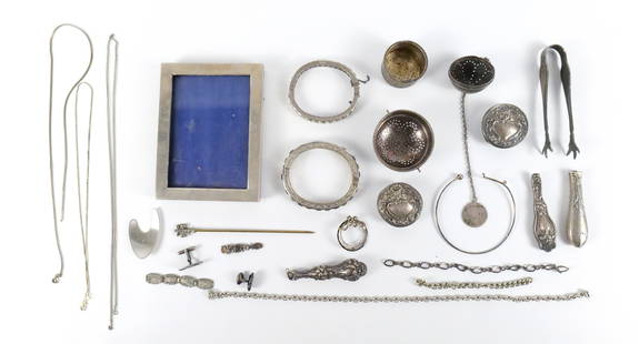 Group of Sterling and Silver Plate Scrap: Group of Sterling and Silver Plate Scrap. The lot includes a mix of vintage/antique mostly sterling and silver plate scrap including lengths of chain, art nouveau vanity jar lids, and more. Used. All