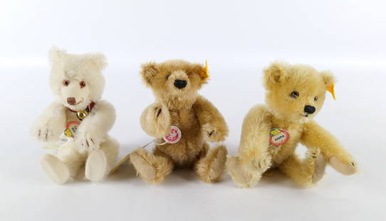 Lot of 3 Mohair Historic Steiff Miniature Bears: Lot of 3 Mohair Historic Steiff Miniature Bears. Including Teddy Baby 16 (1930), Cinnamon Bar 16 (1906), and Petsy 16 Alt Gold (1927). All come with tags. Teddy Baby is missing the ear button. Measure
