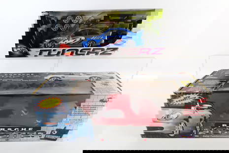 Lot of 2 RC Cars: Lot of 2 RC Cars. Including Hot Wheels Tunerz and Porsche Boxster. Both come with original boxes. All invoices must be paid within 24 hours of the sale. We offer multiple shipping options please read