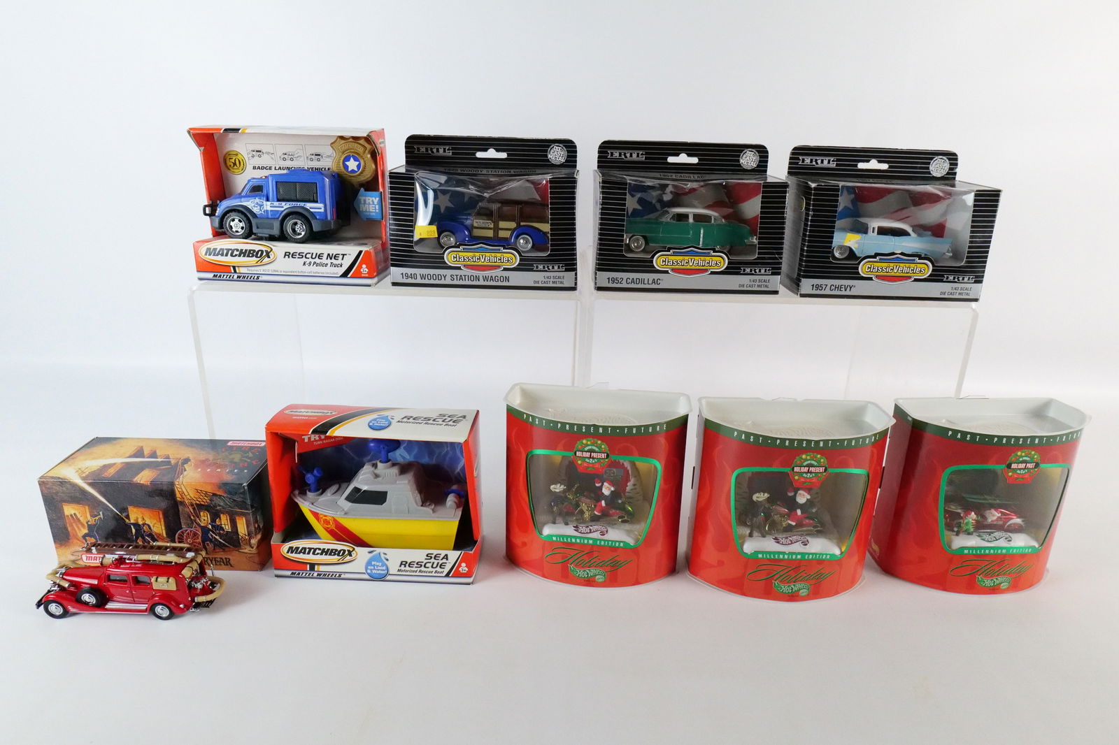 Lot of Hot Wheels, Ertl and Matchbox Vehicles: Lot of Hot Wheels, Ertl and Matchbox Vehicles. Including (3) Ertl 1:43 Scale : 1952 Cadillac, 1940 Woody Station Wagon, and 1957 Chevy, Matchbox Models of Yesteryear Fire Truck, (2) Plastic Matchbox R