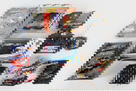 Lot of RC Cars and Accessories: Lot of RC Cars and Accessories. Including Tonka Hyper Drivers - In Box, Carson Remote Control - Open Box, Modifiers 1999 Mitsubishi Eclipse GSX in Package, Fast and Furious Brian's Toyota Supra - New