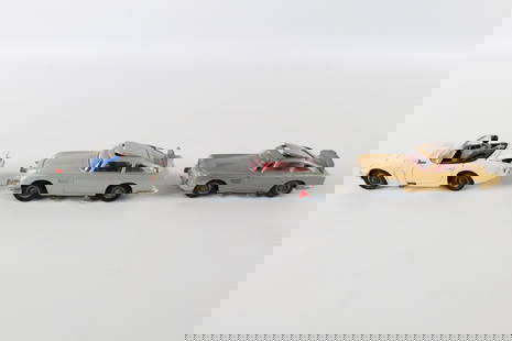 Lot of 3 Corgi James Bond Cars: Lot of 3 Corgi James Bond Cars. Including Toyota 2000 GT, and 2 Aston Martin DB5. Trunk will not stay closed on the 2000 GT. The roofs on the Aston Martin's also have some issues - loose and won't sta