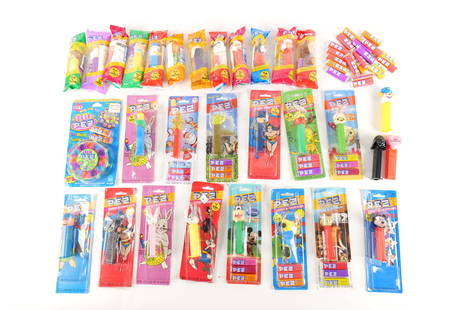 Lot of Pez: Lot of Pez. Including Ice Age, Christmas, Trucks, Mickey Mouse Clubhouse, Looney Tunes, Chicken Little, Power Pez, Disney, and More. Approx more than 3/4 of them are sealed. All invoices must be paid