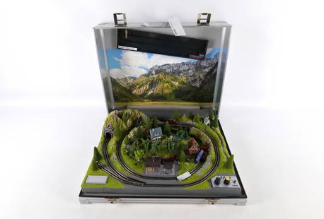 Noch Z Scale Train Set - "Serfaus": Noch Z Scale Train Set - "Serfaus". Comes in briefcase. Includes some cars. Has some loose parts but overall seems pretty complete. All invoices must be paid within 24 hours of the sale. We offer mult