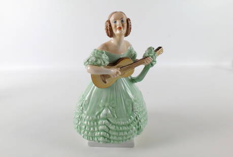 Herend Hand Painted Hungarian Folk Art Porcelain Figurine: Herend Hand Painted Hungarian Folk Art Porcelain Figurine. Depicting woman playing guitar. Green Dress. Measures 8.25" tall x 5.5" wide. All invoices must be paid within 24 hours of the sale. We offer