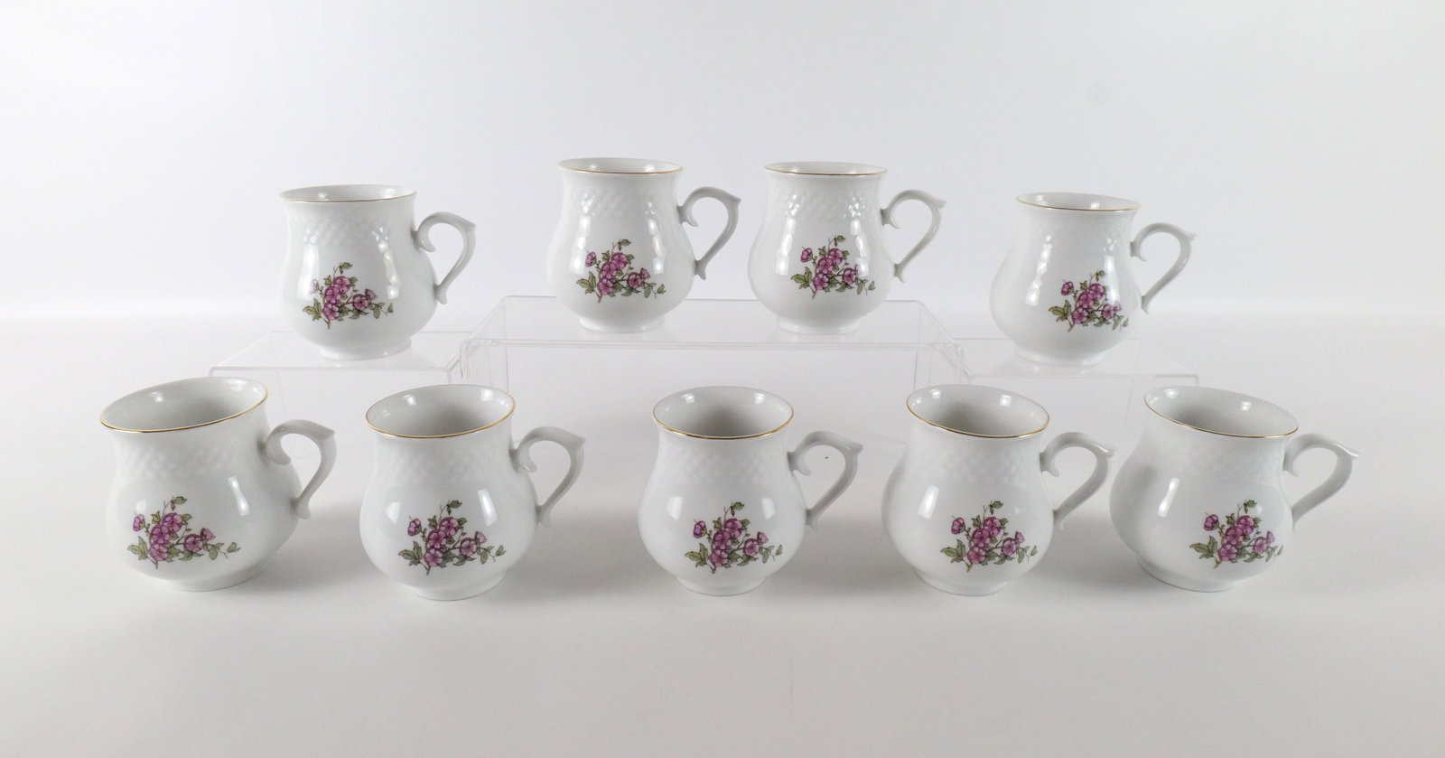 Set of 9 Hungarian Hollahazza Cherry Blossom Mugs: Set of 9 Hungarian Hollahazza Cherry Blossom Mugs. Measure 4" tall. All invoices must be paid within 24 hours of the sale. We offer multiple shipping options please read the shipping terms to understa