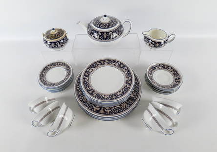 Wedgwood Florentine Dinnerware Set - 36 Pieces: Wedgwood Florentine Dinnerware Set - 36 Pieces. Including (6) Dinner Plates, (7) Salad Plates, (8) Bread Plates, (6) Cups, (6) Saucers, Creamer, Sugar and Teapot - Small crack on underside of base.
