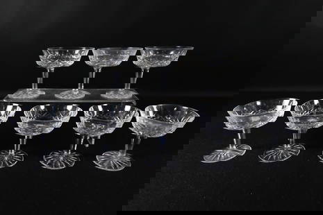 Set of 8 Waterford Champagne Glasses: Set of 8 Waterford Champagne Glasses - Lismore Pattern. Good Condition. Measures 4.25" tall. All invoices must be paid within 24 hours of the sale. We offer multiple shipping options please read the s