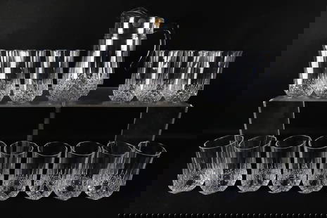 Cristal D'Arques French Lead Crystal Lemonade Set: Cristal D'Arques French Lead Crystal Lemonade Set. Including 15 Glasses and Pitcher - Longchamp Pattern. Largest measures 10" tall. All invoices must be paid within 24 hours of the sale. We offer mult