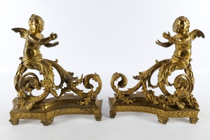 Pair of Gilded Bronze Figural Cherub Ormolu Andirons