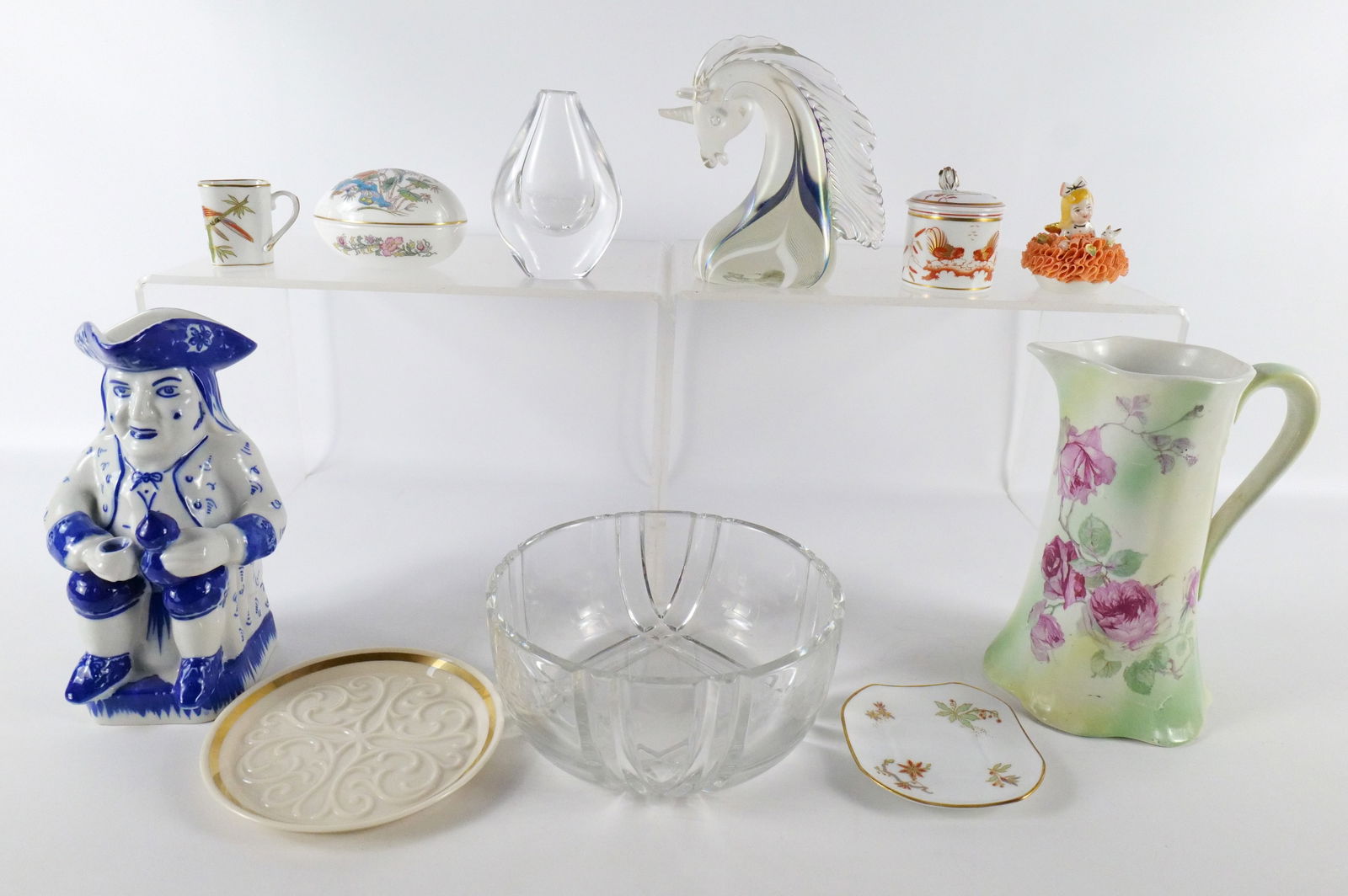 Group Lot of Collectibles - Porcelain and Glass: Group Lot of Collectibles - Porcelain and Glass. Including Blue and White Toby Jug - Made in Portugal, Tall Pitcher Marked Serves, Lenox Seville Wine Bottle Coaster, Crystal Bowl, Richard Genori Espre