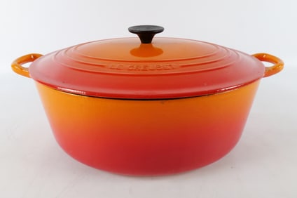 Le Creuset Enameled Cast Iron Flame Orange Oval Dutch Oven with Lid