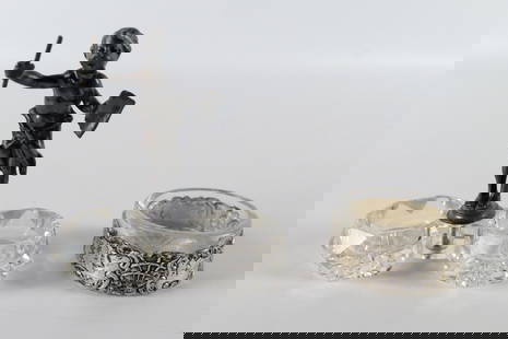 Lot of 2 Antique Salt Cellars: Lot of 2 Antique Salt Cellars. Including Figural Double Crystal Cellar and Diamond Faceted Cut Glass Salt with Silver Bottom. Tallest measures 3". All invoices must be paid within 24 hours of the sale