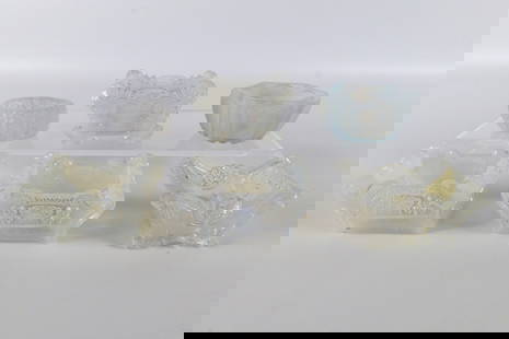 Lot of 6 Antique Opalescent Pressed Glass Salt Cellars: Lot of 6 Antique Opalescent Pressed Glass Salt Cellars. Includes 5 Master Salts and one Salt Cellar. Some have fleabite chipping at the rims. One has multiple cracks. Largest measures 2.75" tall. All