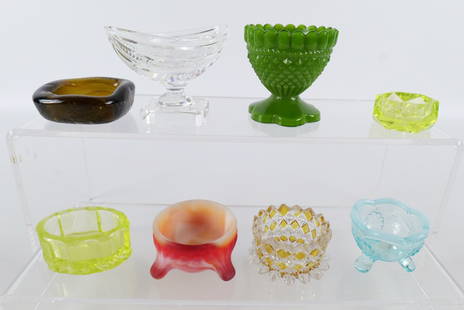 Lot of 8 Open Salt Cellars and Master Salts: Lot of 8 Open Salt Cellars and Master Salts. Including Vaseline Glass, Waterford Crystal - Some Chipping, Green Pressed Glass, Amber Glass, Imperial Slag Glass, Opalescent Blue, and Yellow and Clear.