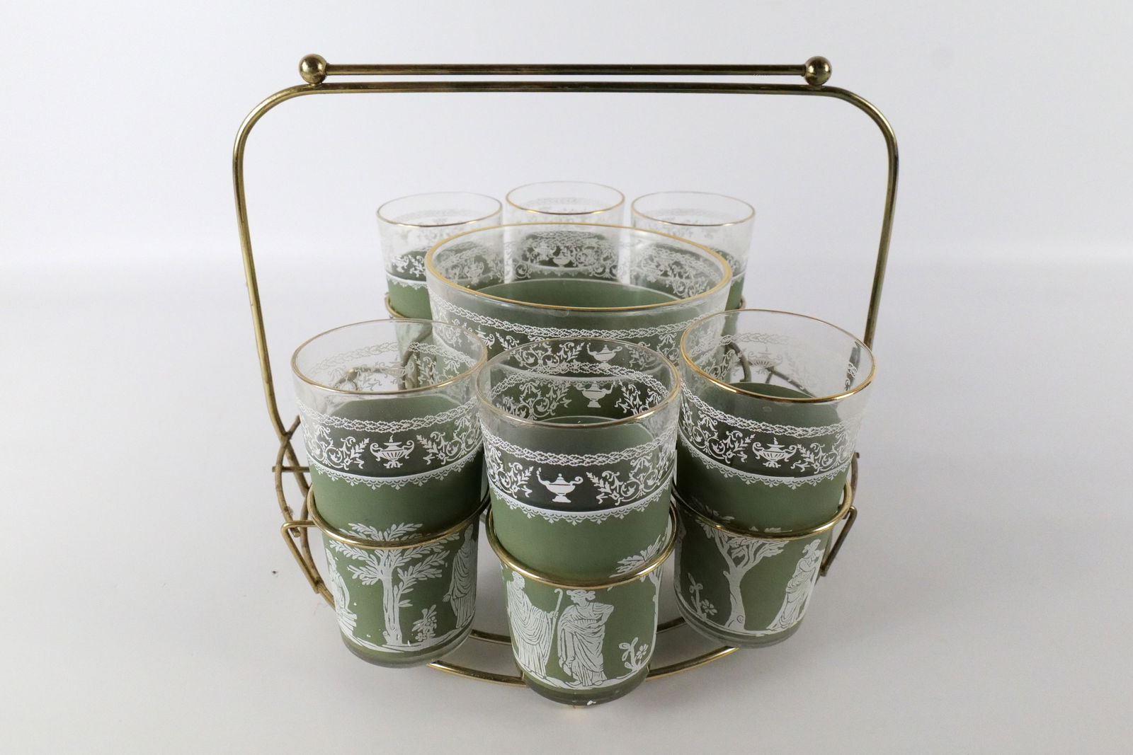 Wedgwood Jeanette Hellenic Green Jasperware Glass Set: Wedgwood Jeanette Hellenic Green Jasperware Glass Set - Mid Century Modern. Comes with Center Bowl and 6 Glasses with Brass Holder. Missing Shot Glasses. Measures 9.5" tall x 12" wide. All invoices mu