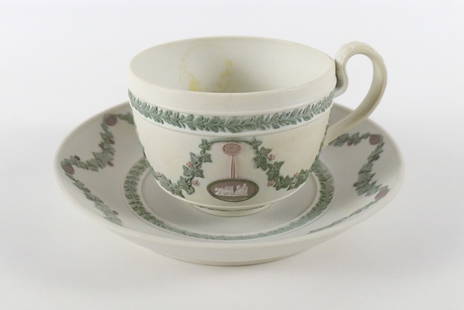 Wedgwood Three Colored Jasperware Cup and Saucer: Wedgwood Three Colored Jasperware Cup and Saucer. Includes White, Lilac and Green Jasper. Cup has been professionally repaired. Can be seen with a blacklight. Hard to see with the naked eye. Measures