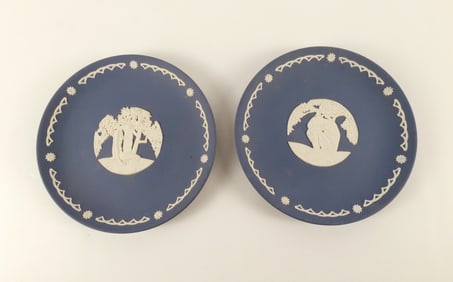 Pair of Wedgwood Portland Blue Jasperware Adam and Eve Plates