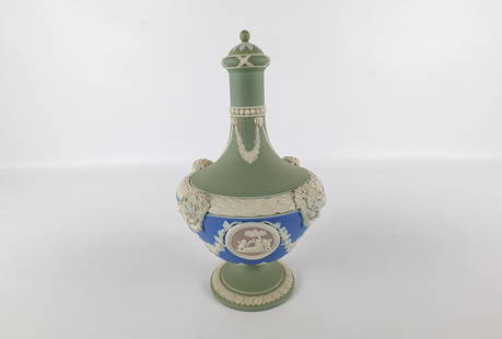 Wedgwood Four Color Jasperware Barber Bottle: Wedgwood Four Color Jasperware Barber Bottle. Has Green Jasper at the neck and foot, Blue at the body with Applied Lilac Medallions depicting Classical Scenes and White Bacchus Heads and Rams Heads wi