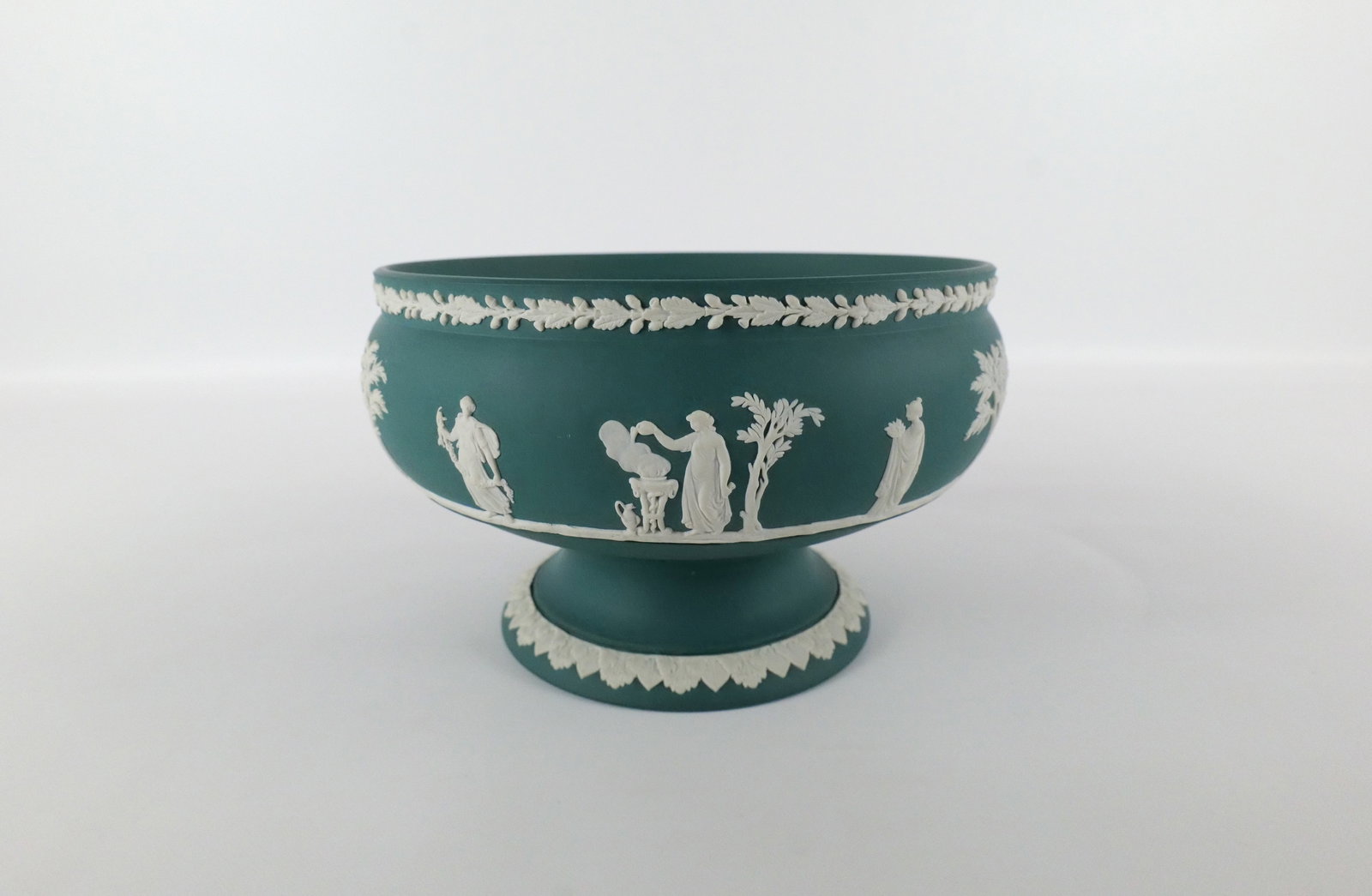Wedgwood Spruce Green Jasperware Center Bowl: Wedgwood Spruce Green Jasperware Center Bowl with Sacrificial Neoclassical Scenes. Measures 5.25" tall x 9" wide. All invoices must be paid within 24 hours of the sale. We offer multiple shipping opti
