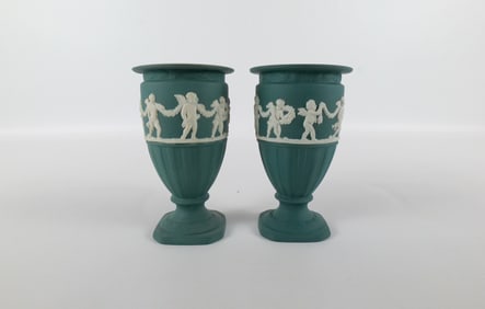 Pair of Wedgwood Spruce Green Footed Urn Vases with Cherubs
