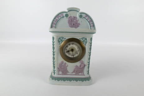 Antique Wedgwood Tricolor Solid White Jasper Mantle Clock: Antique Wedgwood Tricolor Solid White Jasper Mantle Clock. Has Lilac and Sage Green Applied Motif. Needs a cleaning. Top Crest States Tempus Fugit (Time Flies). Please refer to pictures for details of