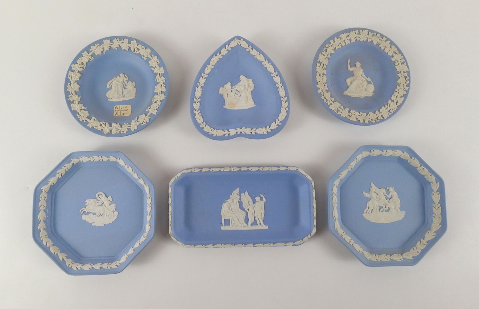Lot of 6 Wedgwood Blue Jasperware Trinket Dishes: Lot of 6 Wedgwood Blue Jasperware Trinket Dishes. Including Heart Shaped Dish - Image Upside Down, Rectangular Tray, (2) Octagonal Dish, and (2) Small Round Dishes. Tray measures 6". All depicting Neo