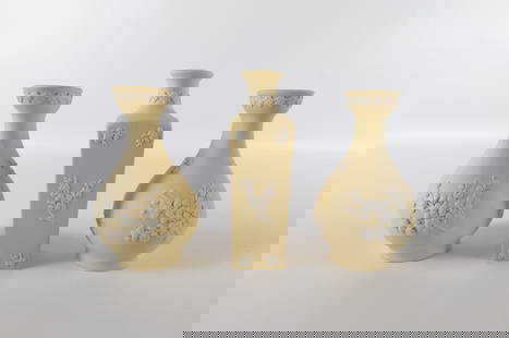 Lot of 3 Wedgwood Primrose Jasper Prunus Flower Vases: Lot of 3 Wedgwood Primrose Yellow Jasperware Prunus Flower Bud Vases. Including Pair of Bud Vases measuring 5" and Square Bud Vase measuring 5.5". All invoices must be paid within 24 hours of the sale