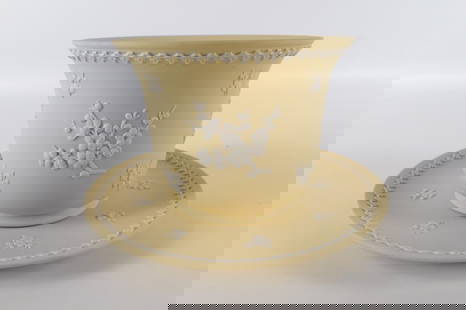 Wedgwood Primrose Yellow Jasperware Flower Pot and Plate Lot: Wedgwood Primrose Yellow Jasperware Flower Pot and Plate Lot - Prunus Motif. Pot measures 4.5" tall x 5.75". Plate measures 8" diameter. All invoices must be paid within 24 hours of the sale. We offer