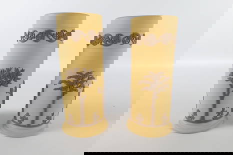 Lot of 2 of Wedgwood Taupe on Cane Yellow Jasperware Spill Vases: Lot of 2 of Wedgwood Taupe on Cane Yellow Jasperware Spill Vases. Both depicting Neoclassical figures however they are not exactly the same. One is also slightly taller. Largest measures 6.75". All in