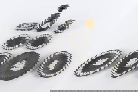 Lot of Wedgwood Black Basalt Jasperware Pieces: Lot of Wedgwood Black Basalt Jasperware Pieces. Including Trinket Dish, Lighter, 2 Ashtrays with Grapevine Scene, Bud Vase, Heart Shaped Trinket, and 3 Small Round Dishes. Tallest measures 5". All inv