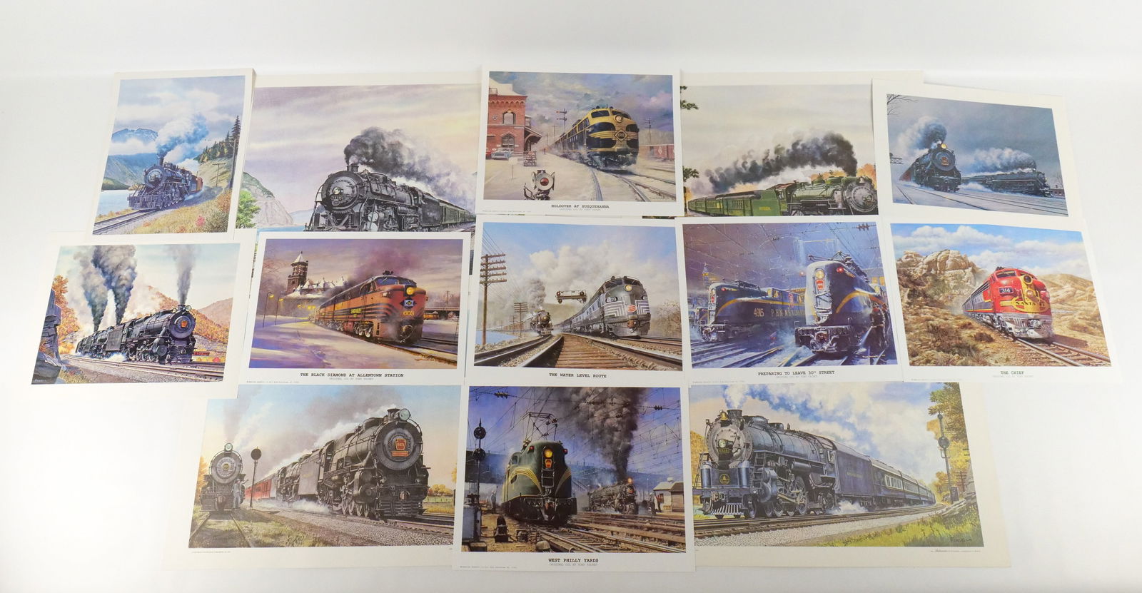 Lot of Mixed Unframed Train Lithographs and Prints: Lot of Mixed Unframed Train Lithographs and Prints by Howard Fogg and Tony Fachet. Including Tony Fachet: "Holdover at Susquehanna", "Preparing to Leave 30th Street", "The Black Diamond at Allentown S