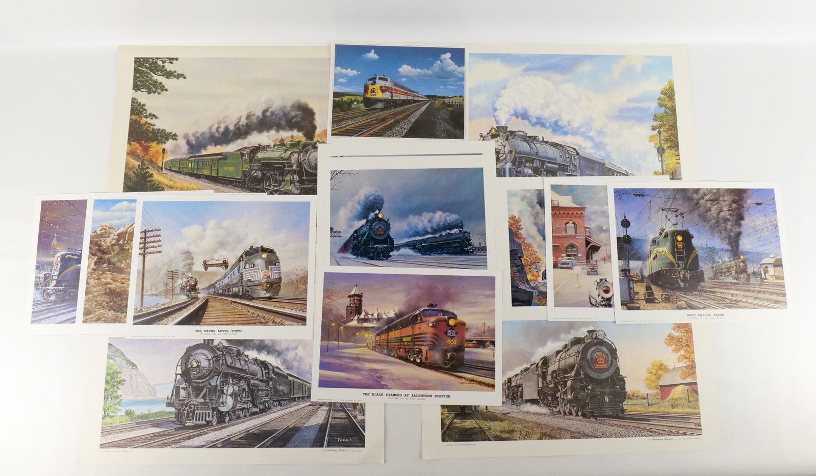 Lot of Mixed Unframed Train Lithographs and Prints: Lot of Mixed Unframed Train Lithographs and Prints by Howard Fogg and Tony Fachet. Including Tony Fachet: "Holdover at Susquehanna", "Preparing to Leave 30th Street", "The Black Diamond at Allentown S
