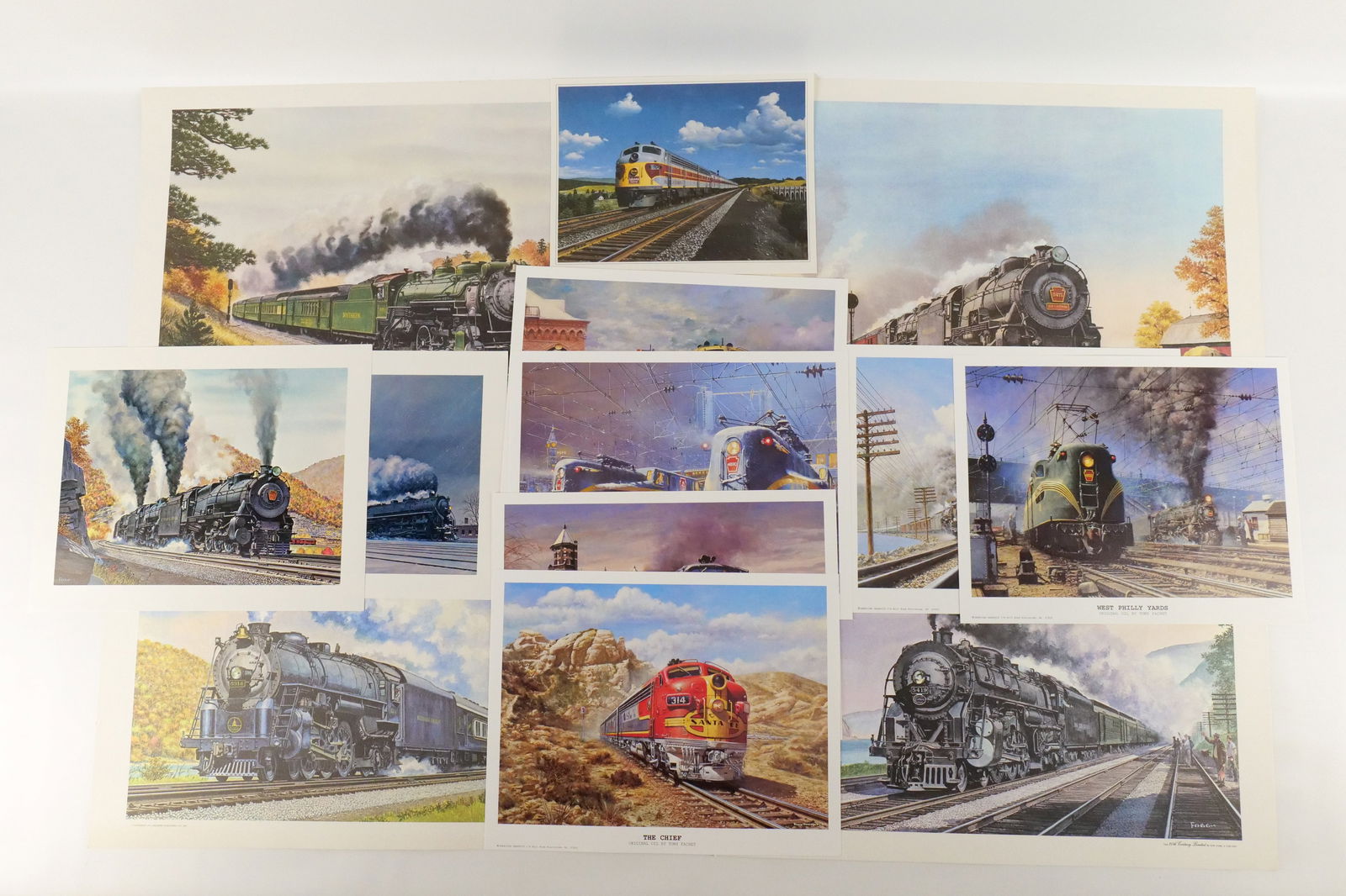 Lot of Mixed Unframed Train Lithographs and Prints: Lot of Mixed Unframed Train Lithographs and Prints by Howard Fogg and Tony Fachet. Including Tony Fachet: "Holdover at Susquehanna", "Preparing to Leave 30th Street", "The Black Diamond at Allentown S