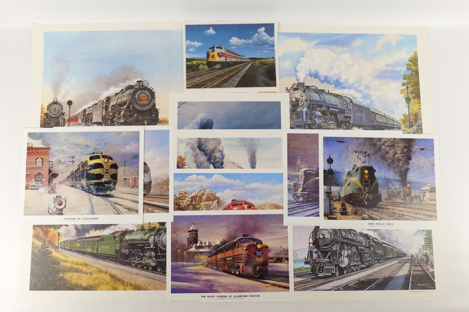 Lot of Mixed Unframed Train Lithographs and Prints: Lot of Mixed Unframed Train Lithographs and Prints by Howard Fogg and Tony Fachet. Including Tony Fachet: "Holdover at Susquehanna", "Preparing to Leave 30th Street", "The Black Diamond at Allentown S