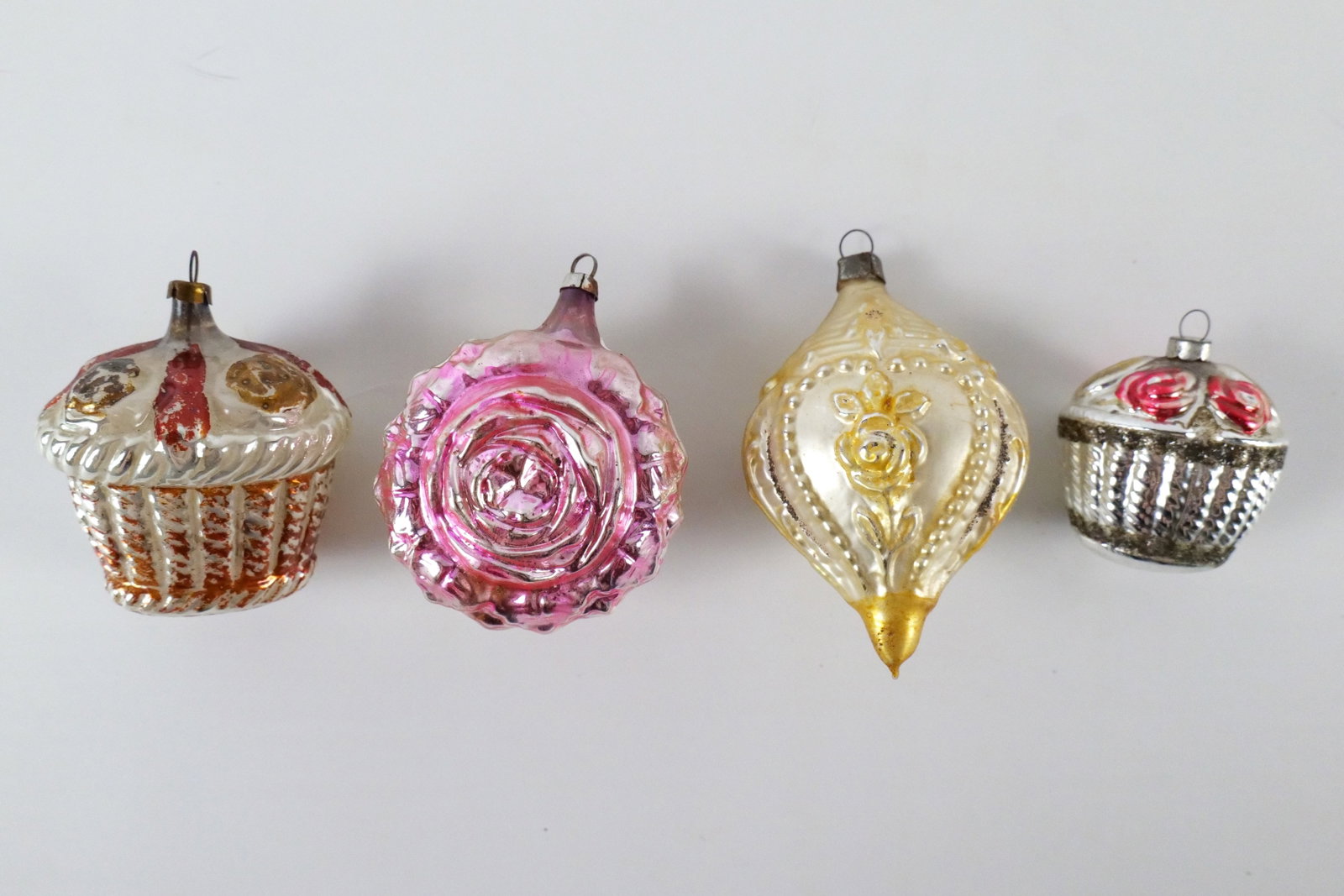Lot of 4 Antique Blown Glass Ornaments: Lot of 4 Antique Blown Glass Ornaments. Including Cupcakes, Rose, and Victorian Lady Bust. Some paint loss. Largest measures 4" long. All invoices must be paid within 24 hours of the sale. We offer mu