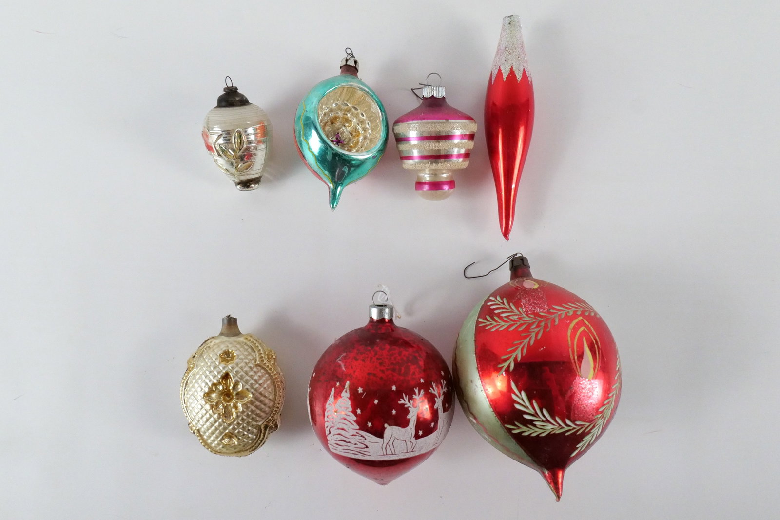 Lot of 7 Vintage Blown Glass Christmas Ornaments: Lot of 7 Vintage Blown Glass Christmas Ornaments. Some have chipping at the top by the hook attachments. Some are missing hook attachments. Also some paint loss. Largest measures 6.5" long. All invoic