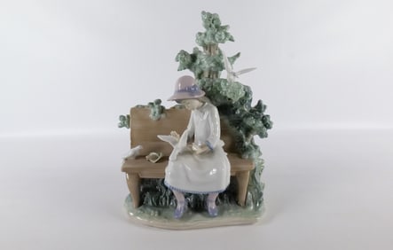 Nao Figurine - Girl on Bench Feeding Birds