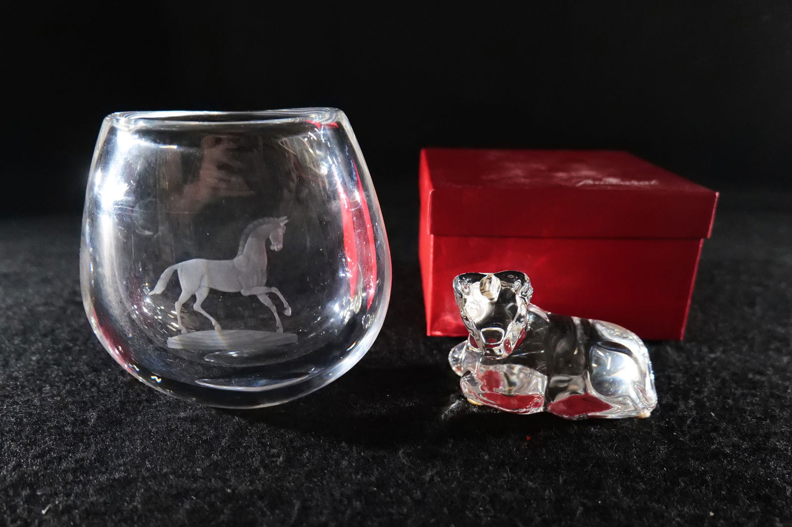 Lot of 2 Quality Crystal Pieces: Lot of 2 Quality Crystal Pieces. Including Orrefors Palmqvist Horse Lead Crystal Vase and Baccarat Crystal Zodiac Cow Figurine. Comes with a Baccarat Box. Tallest measures 6" . All invoices must be pa
