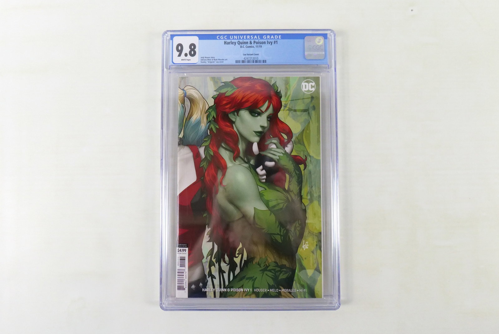 Harley & Ivy #1 - CGC 9.8: Harley & Ivy #1 - CGC 9.8 - Artgerm Variant. Please note that the short boxes in photos do not come with the lot; they are there to give reference to the amount of comics in the lot. All invoices must